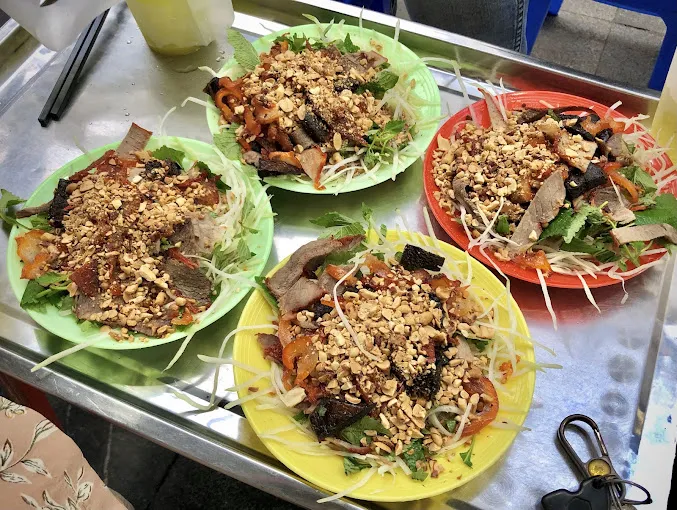 Long Vi Dung's beef jerky salad is generous and looks quite appealing